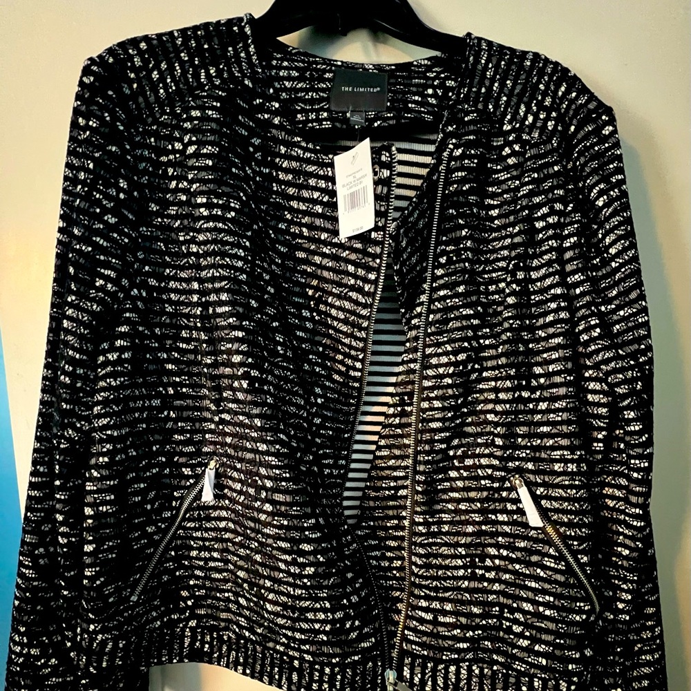 Super cute black and white jacket XL never worn.